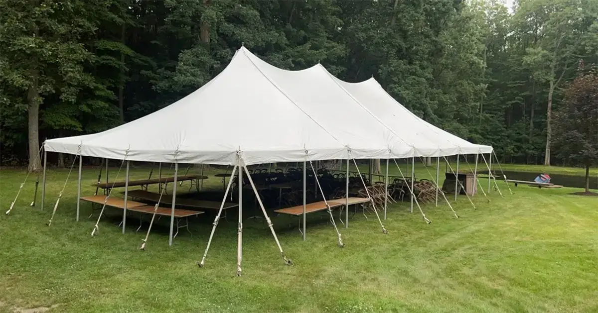 Large canopy pole tent with full-service delivery and setup in Southeast Michigan