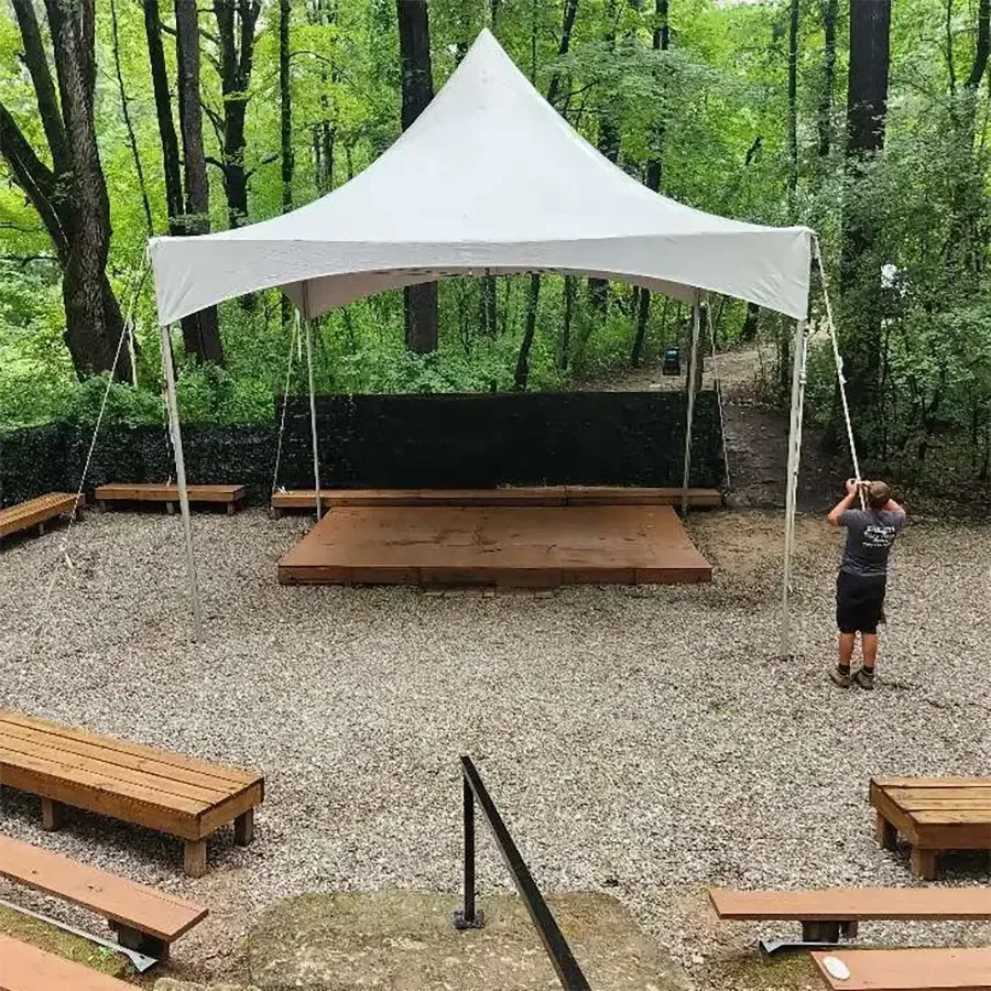 Small frame high peak tent set up on hard surface in Southeast Michigan