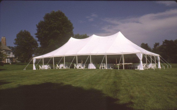 40 by 80 high-peak pole tent wedding in Metamora, MI by Knights Tent & Party Rental