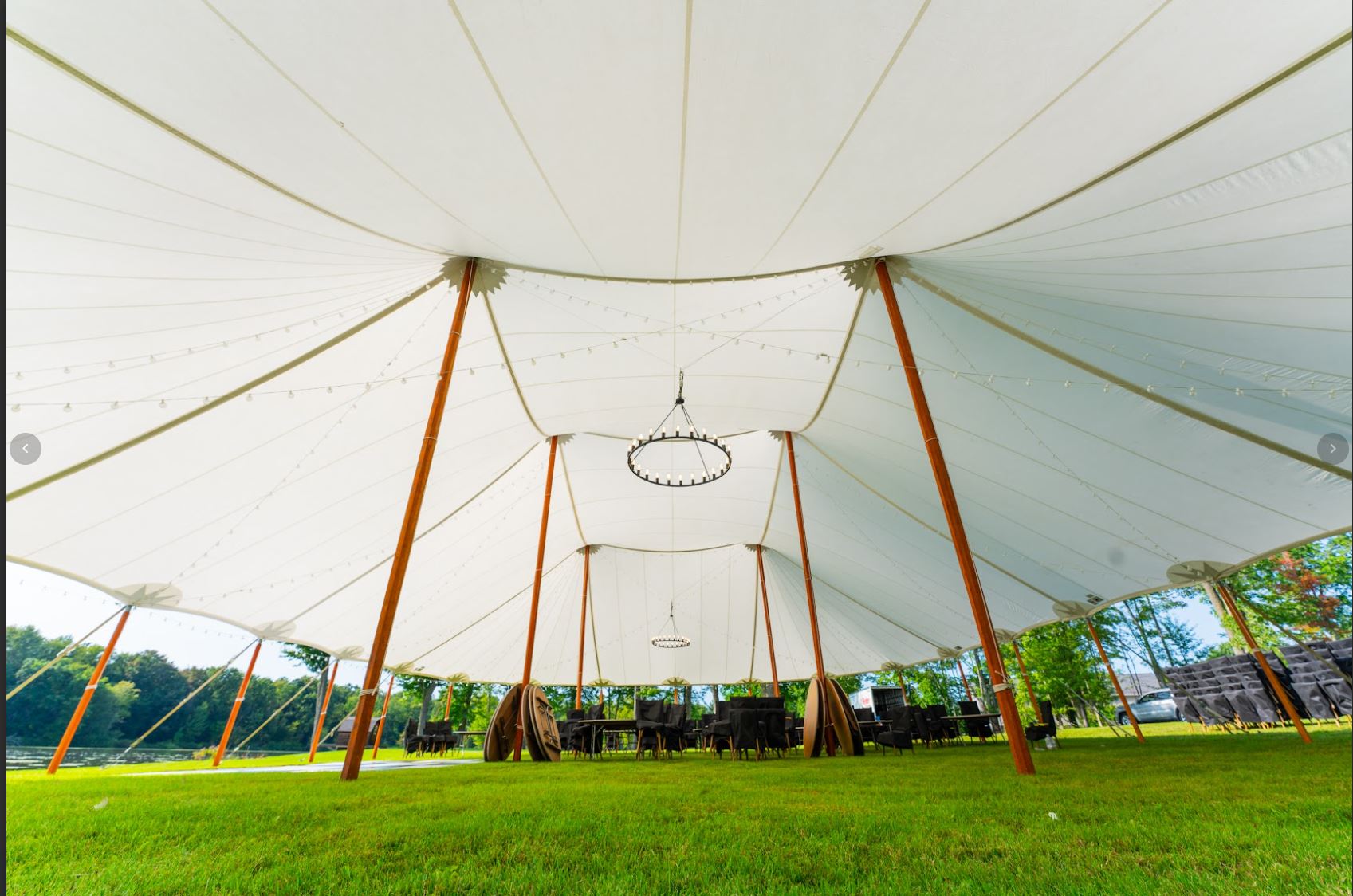 Sailcloth tent wedding in Metamora, MI by Knights Tent & Party Rental