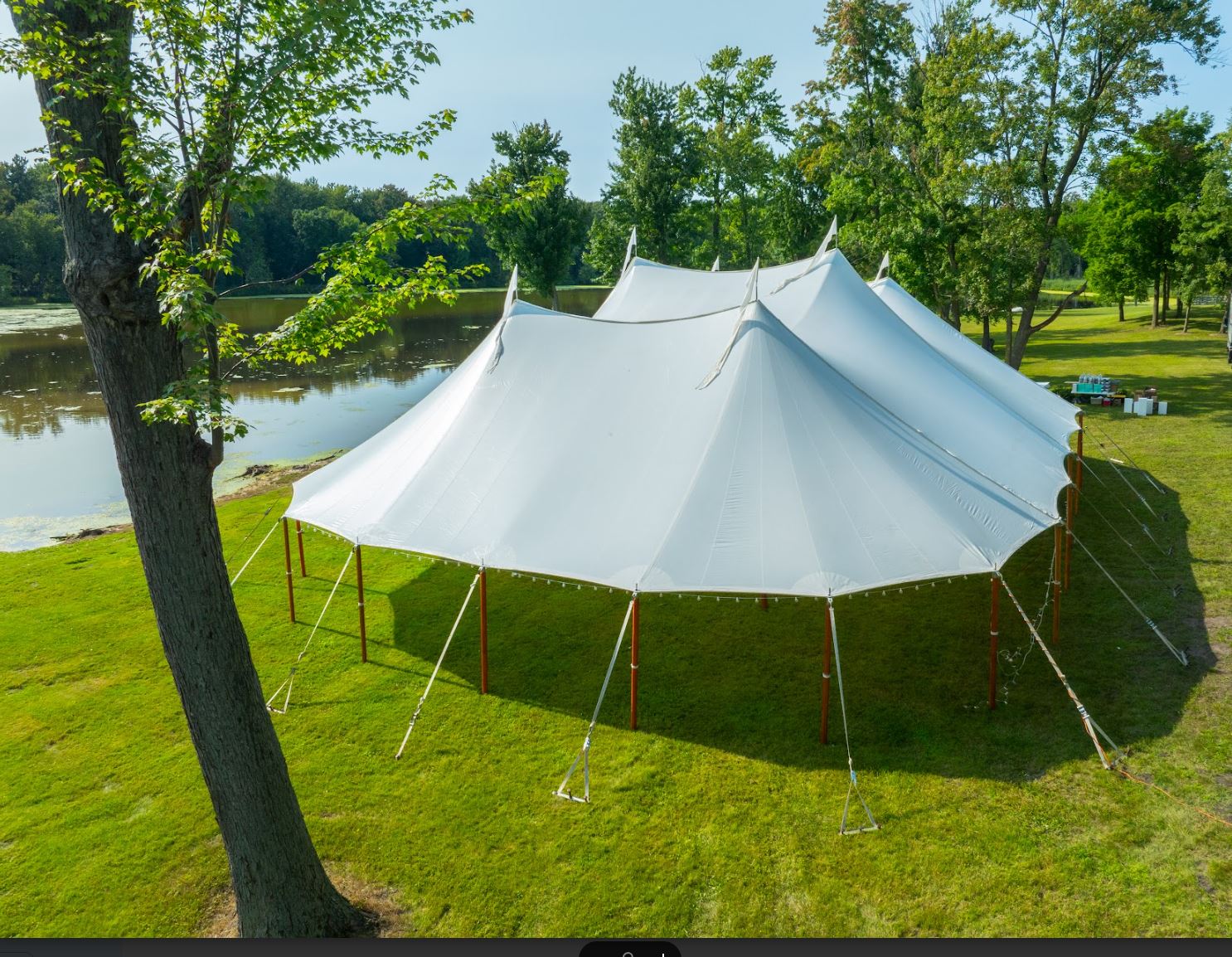 Sailcloth tent wedding in Milford, MI by Knights Tent & Party Rental