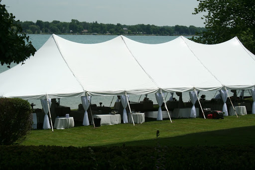 Pole tent wedding in Orchard Lake, MI by Knights Tent & Party Rental