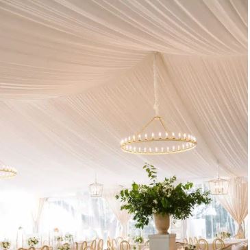 Frame tent wedding with full liner and gold chandelier in Shelby Township, MI by Knights Tent & Party Rental