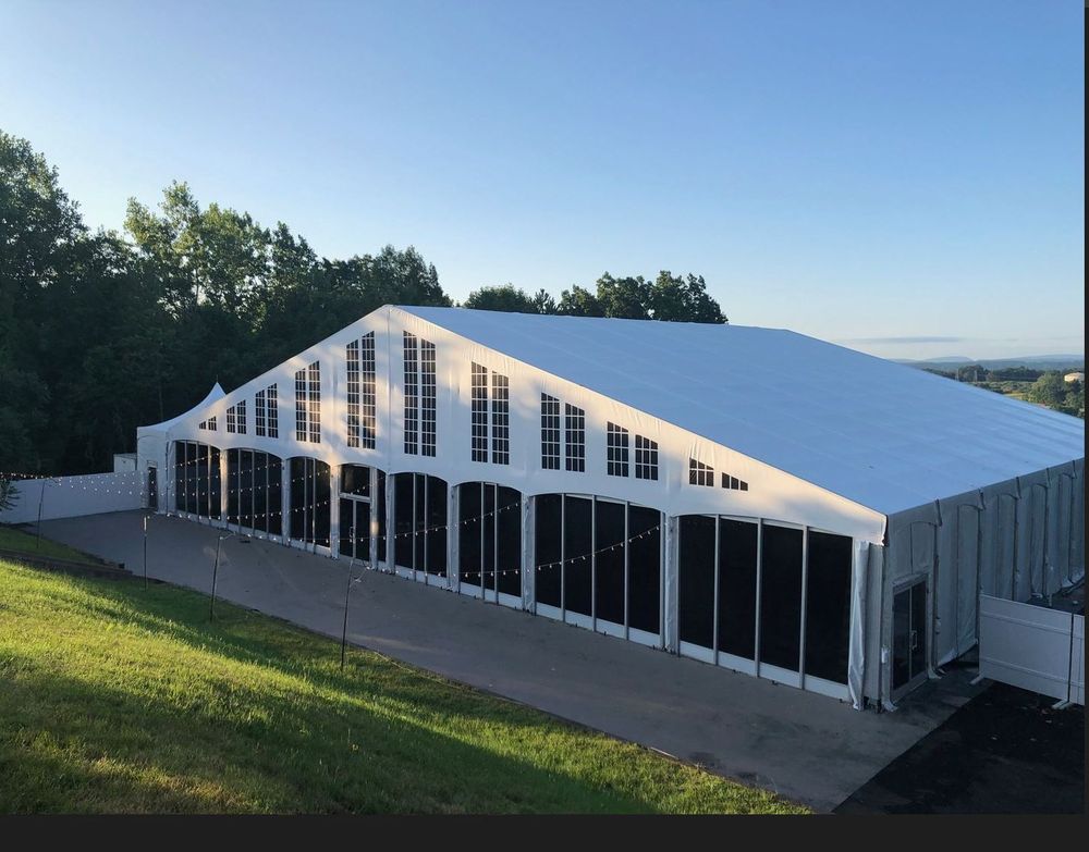 Engineered clearspan structure tent for a corporate event in Southeast Michigan by Knights Tent & Party Rental